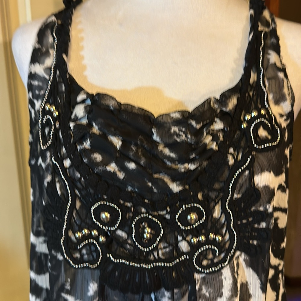 Black sheer material w/ beaded front 
Gently worn